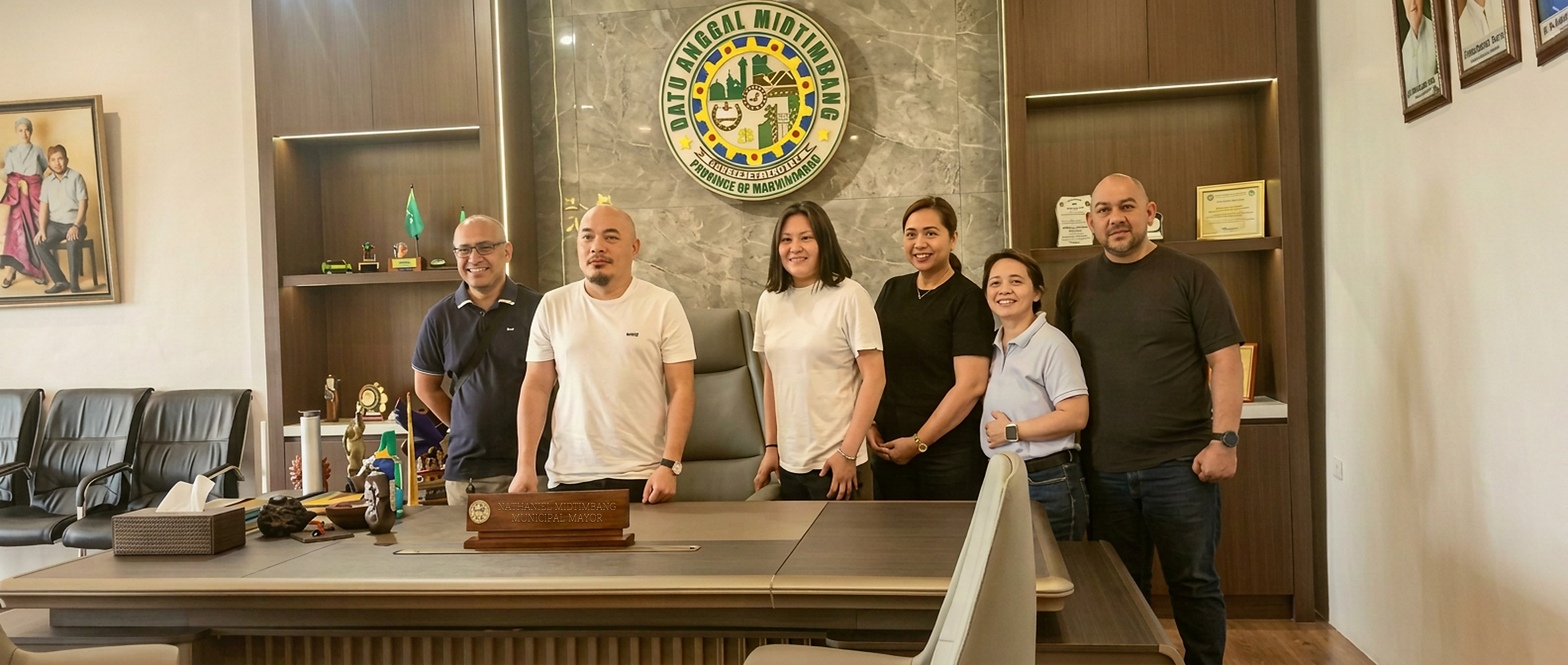 Norodin Yasin and the NY Connect team in a strategic meeting with local government leadership at the mayor's office